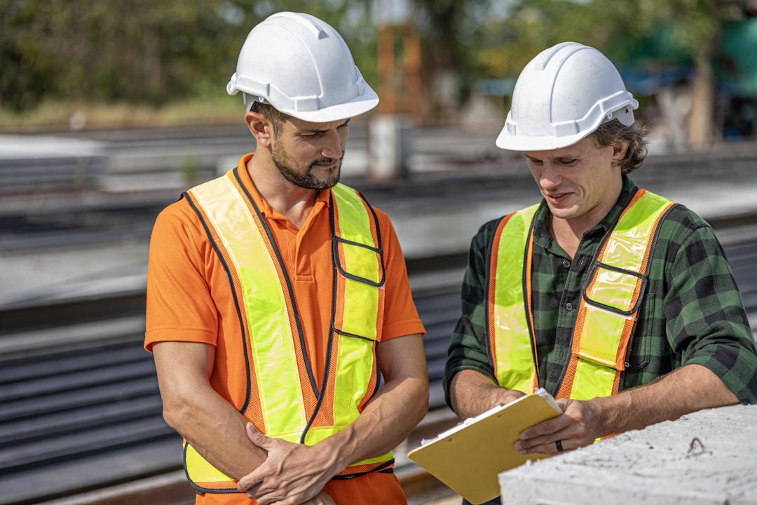 Engineers reviewing plans at a job site